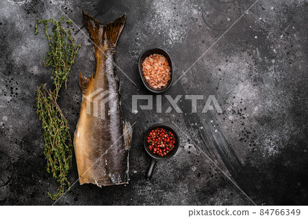 Smoked whole trout, on black dark stone table background, top view flat lay, with copy space for text Smoked whole trout, on black dark stone table background, top view flat lay, with copy space for text 84766349