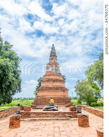 Old brick pagoda in ancient temple in Ayutthaya, old capital city of Thailand, UNESCO World heritage place Old brick pagoda in ancient temple in Ayutthaya, old capital city of Thailand, UNESCO World heritage place 84766378