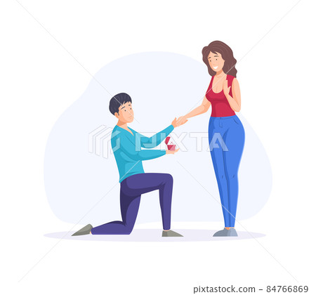 Engagement proposal surprise. Enamored man stands on knee proposing to woman 84766869