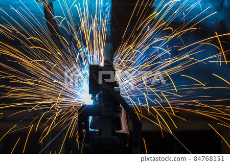 Welder robots movement in a car factory Welder robots movement in a car factory 84768151