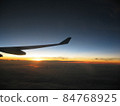 Dawn from the plane 84768925