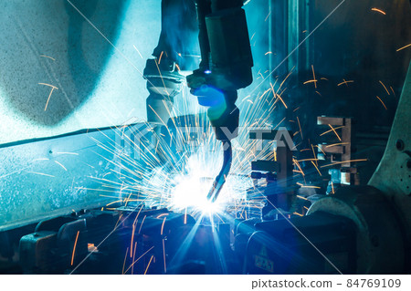 Welding robots movement in a car factory, 84769109