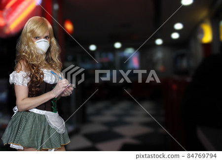 Waitress With Face Mask and Restaurant Background Waitress With Face Mask and Restaurant Background 84769794