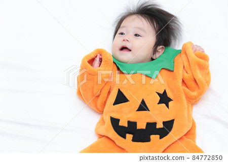 Baby girl dressed up for Halloween 84772850