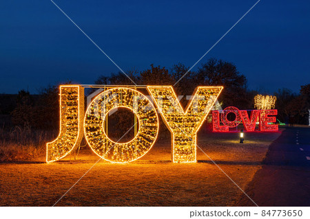 Night view of the beautiful Christmas decoration lights in Mitch Park Night view of the beautiful Christmas decoration lights in Mitch Park 84773650