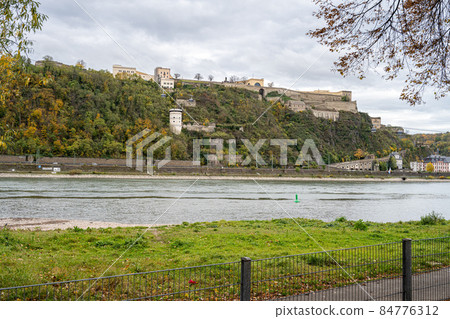 German corner, Koblenz were Rhein and Mosel meet. The fortress Ehrenbreitstein in the background German corner, Koblenz were Rhein and Mosel meet. The fortress Ehrenbreitstein in the background 84776312