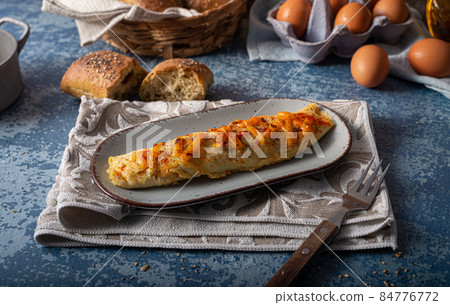 Egg omelette with cheddar Egg omelette with cheddar 84776772