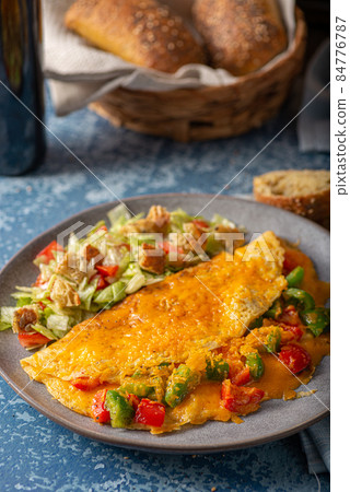 Egg omelette with peppers Egg omelette with peppers 84776787