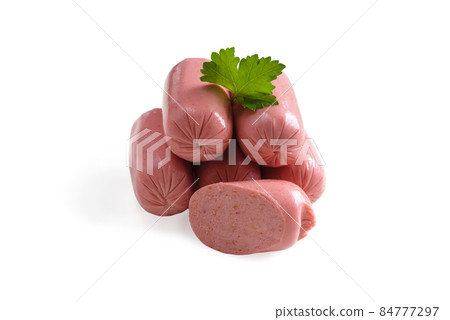Appetizing cocktail sausages with parsley isolated on a white background. 84777297