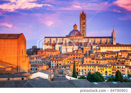 Siena, Tuscany, Italy - Dome sunset with blue sky Siena, Tuscany, Italy - Dome sunset with blue sky 84780901