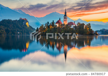 Bled, Slovenia - Sunrise with Julian Alps and Church Santa Maria 84780917