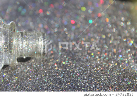 Holographic Nail polish Spilled on Table, Shallow DOF Holographic Nail polish Spilled on Table, Shallow DOF 84782055