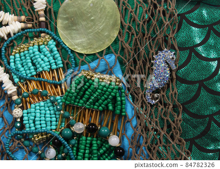 Mermaid Fashion With Jewelry and Fishing Net Close up 84782326