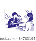 A man buying a ticket at the reception desk at the station 84783195