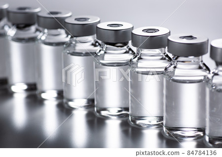 Multiple vials containing vaccine Multiple vials containing vaccine 84784136