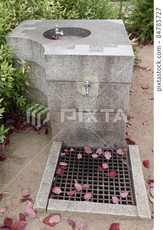 Park water supply stone drinking fountain Park water supply stone drinking fountain 84785727