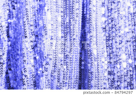 Textured background shiny fabric with lurex sequins and trendy color very peri, sparkles. Soft selective focus, blurred Mockup of promotional items in 2022 colors Textured background shiny fabric with lurex sequins and trendy color very peri, sparkles. Soft selective focus, blurred Mockup of promotional items in 2022 colors 84794297