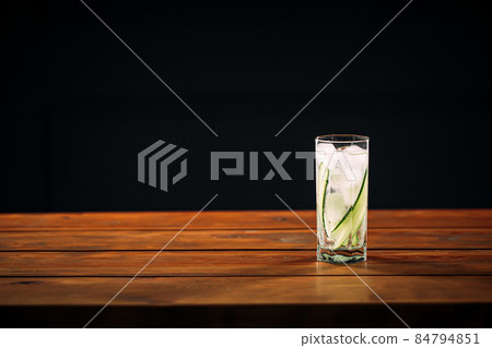 Fresh gin tonic cocktail with rosemary and lime Fresh gin tonic cocktail with rosemary and lime 84794851