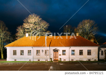Kuressaare, Saaremaa Island, Estonia. Museum Old House Building Near Episcopal Castle In Evening Blue Hour Night. Traditional Medieval Architecture, Famous Attraction Landmark 84795121