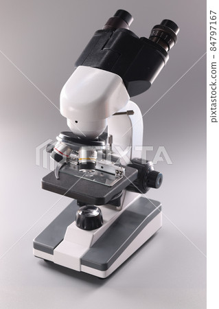 Microscope on gray background Microbiology and healthcare Microscope on gray background Microbiology and healthcare 84797167