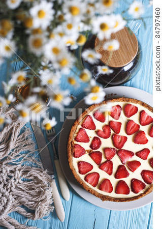 cheesecake with strawberries 84797460