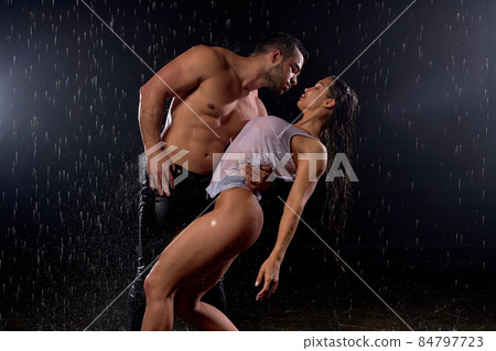 sensual couple passion. Water studio photo. Side view portrait of beautiful man and woman sensual couple passion. Water studio photo. Side view portrait of beautiful man and woman 84797723