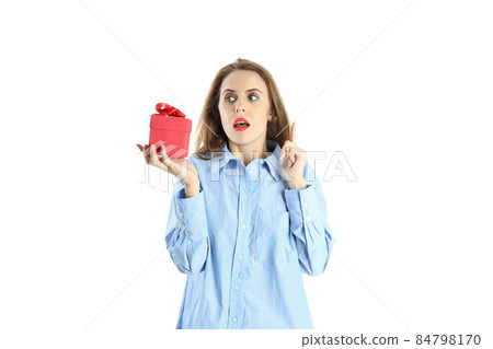 Attractive woman holds gift box, isolated on white background Attractive woman holds gift box, isolated on white background 84798170