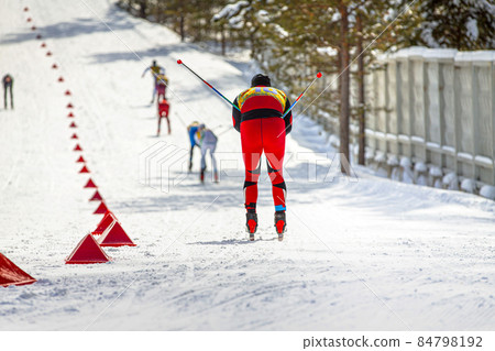 group skier athletes downhill skiing race 84798192