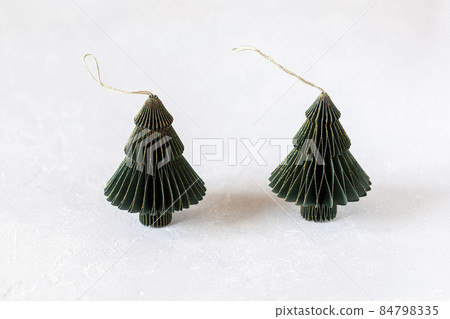 New Year and Christmas paper green and golden decorative trees New Year and Christmas paper green and golden decorative trees 84798335