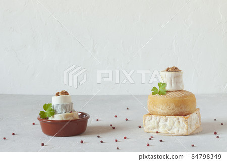 Towers made of different types of cheese, side view Towers made of different types of cheese, side view 84798349