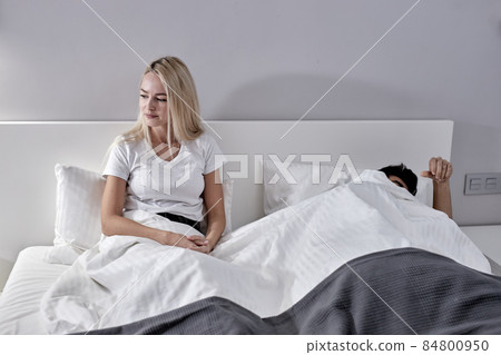 Couple With Problems Having Disagreement In Bed, Offended Female On Bed 84800950