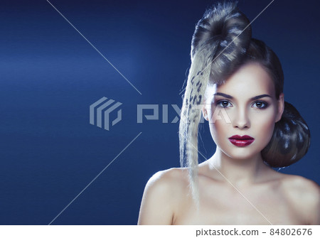 young elegant woman with creative hair style leopard print close up halloween stylish 84802676