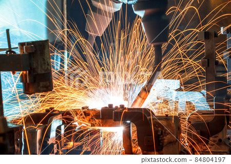 Welding robots movement in a car factory 84804197