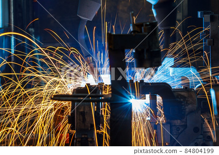 Welding robots movement in a car factory 84804199