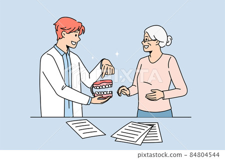 Male doctor consult old patient about teeth prosthesis Male doctor consult old patient about teeth prosthesis 84804544