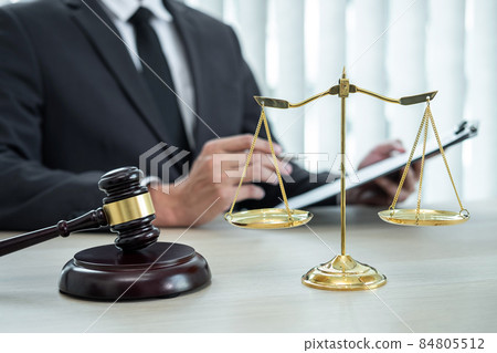 Male lawyer working with legal case document contract in office, law and justice, attorney, lawsuit concept Male lawyer working with legal case document contract in office, law and justice, attorney, lawsuit concept 84805512