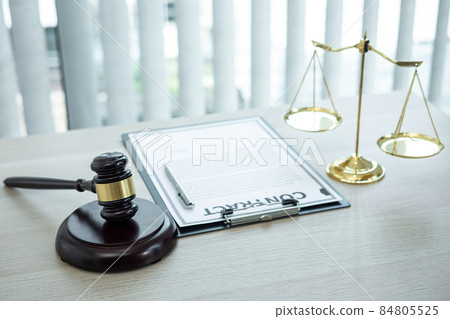 Judge gavel with Justice at law firm in background with legal case document contract, law and justice, attorney, lawsuit Judge gavel with Justice at law firm in background with legal case document contract, law and justice, attorney, lawsuit 84805525