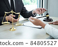 Male lawyer or counselor discussing negotiation legal case with client meeting with document contract in office, law and justice, attorney, lawsuit concept 84805527