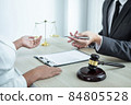 Professional Male lawyer or counselor discussing negotiation legal case with client meeting with document contract in office, law and justice, attorney, lawsuit concept 84805528