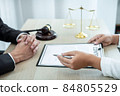 Male lawyer or counselor discussing negotiation legal case with client meeting with document contract in office, law and justice, attorney, lawsuit concept 84805529