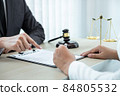Professional Male lawyer or counselor discussing negotiation legal case with client meeting with document contract in office, law and justice, attorney, lawsuit concept 84805532