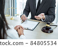 Professional Male lawyer or counselor discussing negotiation legal case with client meeting with document contract in office, law and justice, attorney, lawsuit concept 84805534