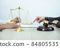 Professional Male lawyer or counselor discussing negotiation legal case with client meeting with document contract in office, law and justice, attorney, lawsuit concept 84805535