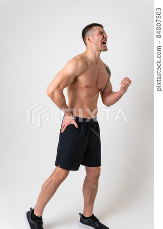 Aching hip in a man white background strong pain body muscle, backache white massage medicine, human holding. lumbar lower suffer attractive Aching hip in a man white background strong pain body muscle, backache white massage medicine, human holding. lumbar lower suffer attractive 84807803