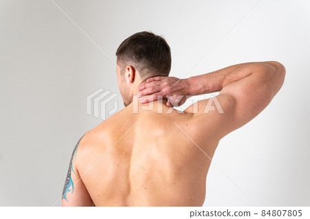 The muscles of the neck in a man on a white background are hurt pain hurt injury, cramp sick man young medical, illness chronic. Touching red care, lower suffer attractive The muscles of the neck in a man on a white background are hurt pain hurt injury, cramp sick man young medical, illness chronic. Touching red care, lower suffer attractive 84807805
