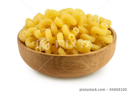 raw pasta cavatappi in wooden bowl isolated on white background with clipping path and full depth of field. 84808100