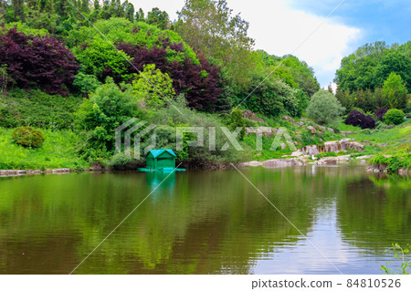 View of pond in Sofiyivka park in Uman, Ukraine View of pond in Sofiyivka park in Uman, Ukraine 84810526
