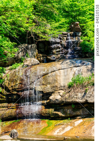 Beautiful waterfall in Sofiyivka park in Uman, Ukraine Beautiful waterfall in Sofiyivka park in Uman, Ukraine 84810538