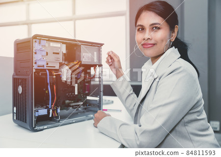 IT women staff officer work in office computer hardware fix repair service working happy smile 84811593