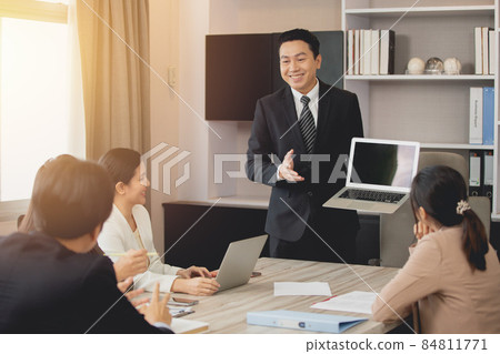 professional adult sale agent standing presentation on meeting room show laptop computer happy smile professional adult sale agent standing presentation on meeting room show laptop computer happy smile 84811771